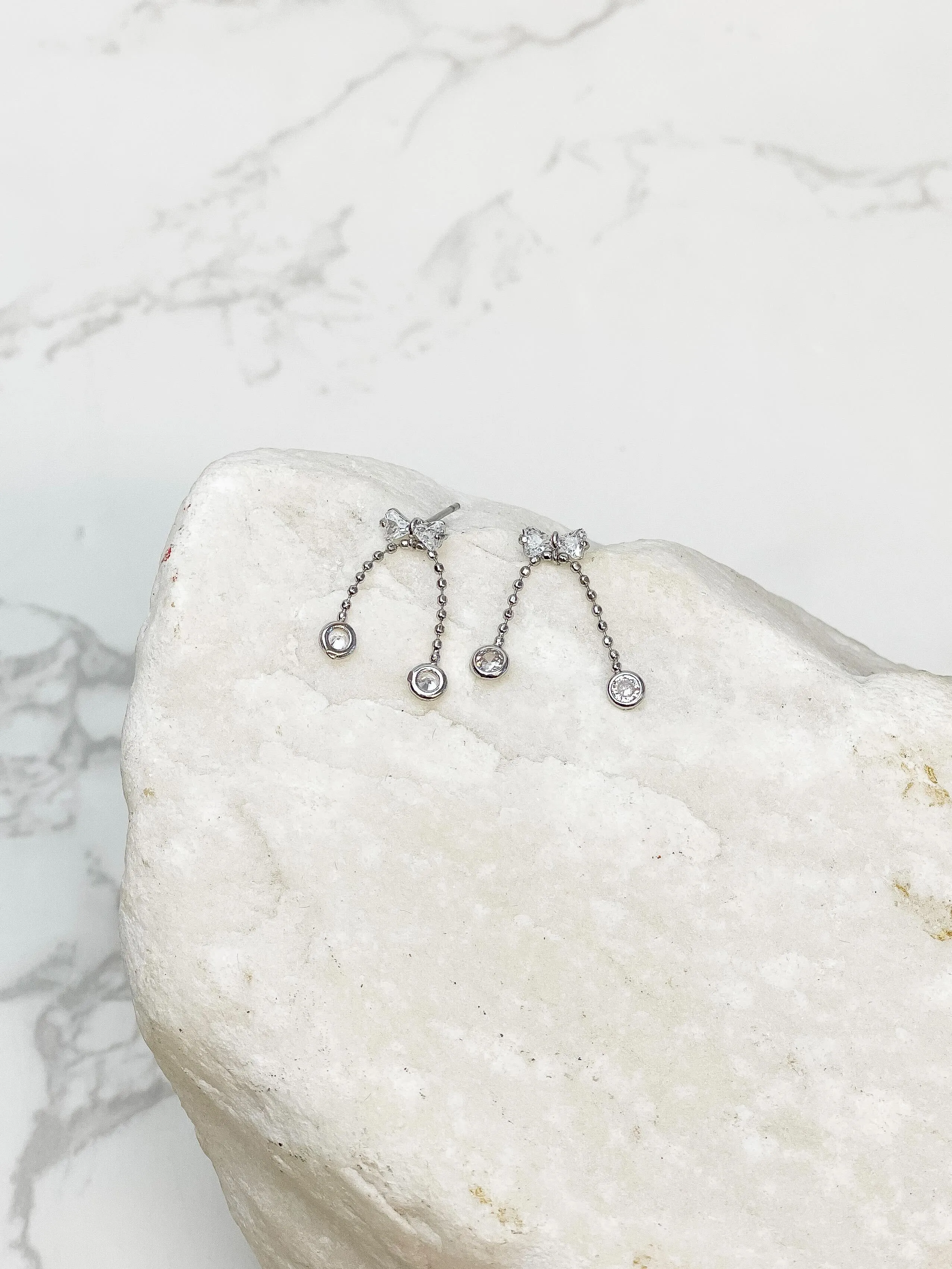 Crystal Bowtie Drop Earrings - Silver
